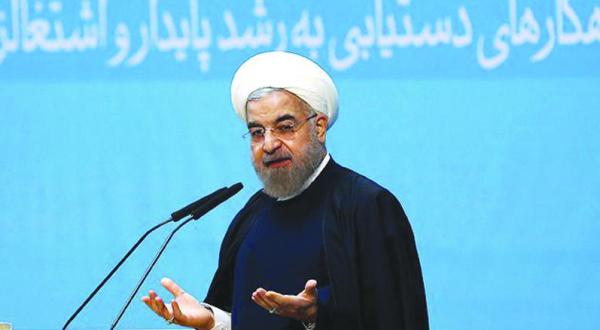 حسن روحانی رئیس جمهور ایران در کنفرانس اقتصادی روز گذشته در تهران (آ.ف.ب)