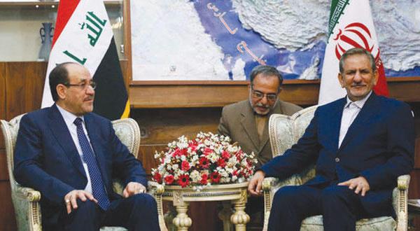 اسحاق جهانگیری معاون اول رئیس جمهور ایران به هنگام استقبال از نوری المالکی معاون برکنار شده رئیس جمهور عراق در تهران – عکس از خبرگزاری مهر